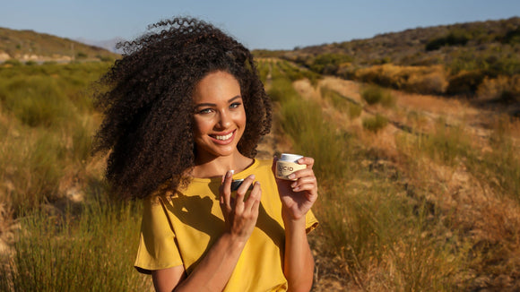 Woman with Annique Rooibos cream